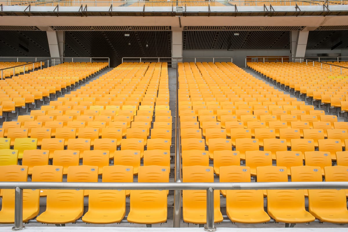 Multi-sport indoor arena with running track and seating